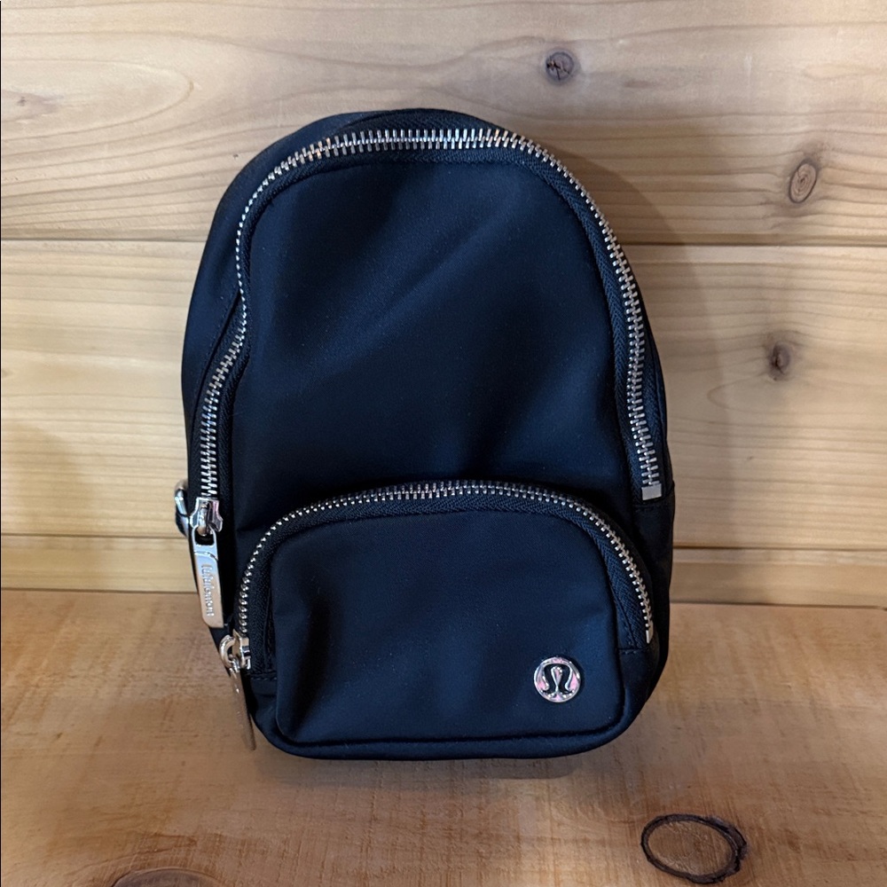 lululemon athletica Black Mini Sling Backpack with Silver Hardware
